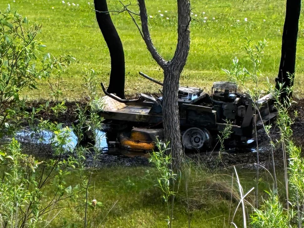 Lawn mower fire contained before spreading west of Richer